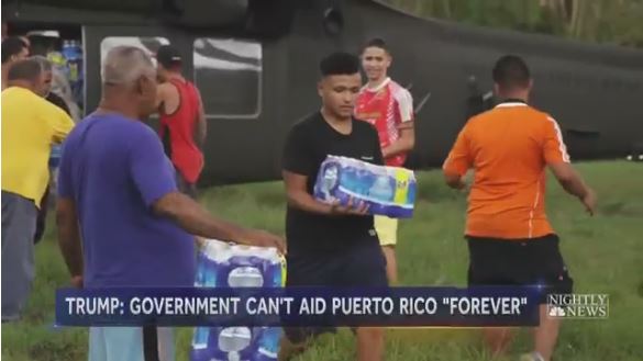 Trump Warns Puerto Rico: ‘Aid Can’t Last Forever’ NBC video grab from Puerto Rico of survivors carrying bottled water.