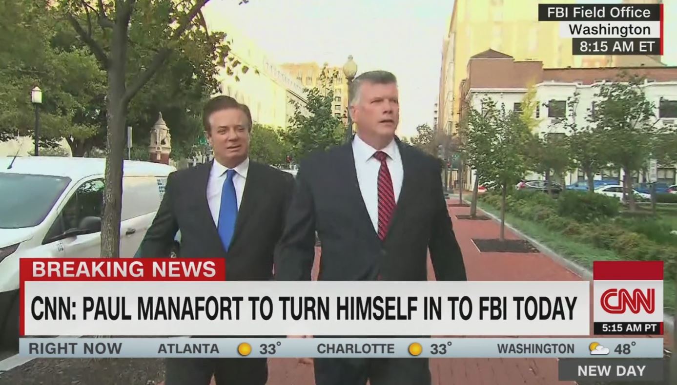 Screenshot of Manafort turning himself in to FBI from CNN.
