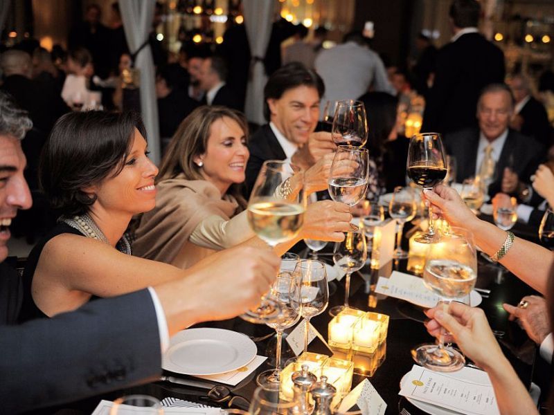 A dinner party featuring wealthy people