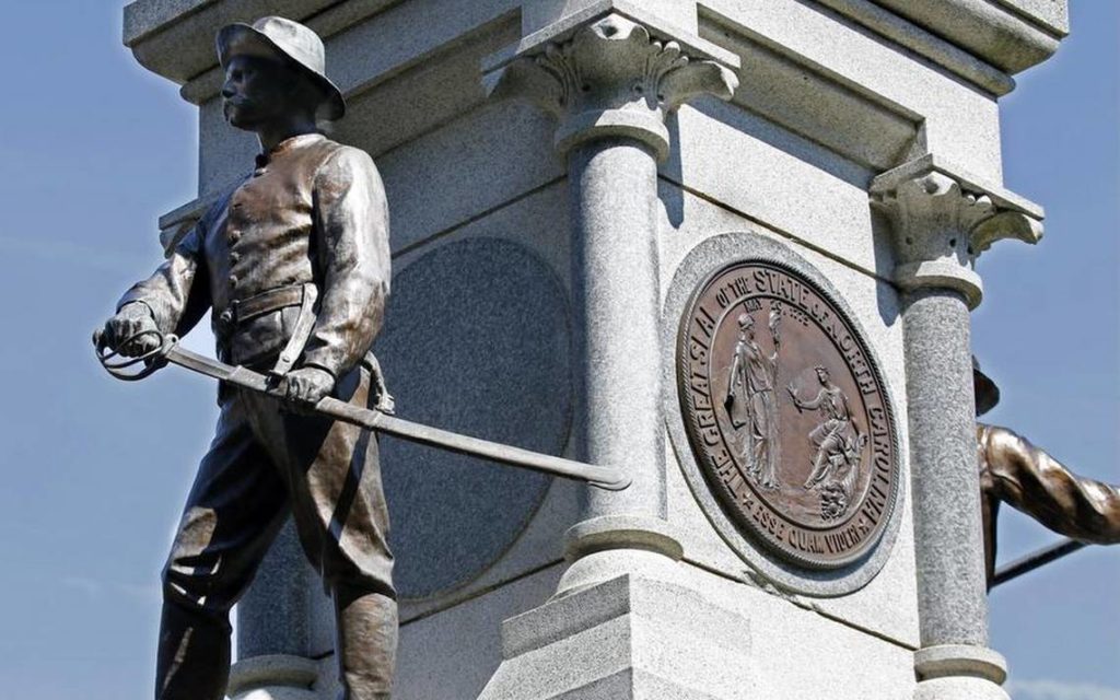 Civil Rights Board Heads Into Hostile Territory Statue of a Confederate soldier.