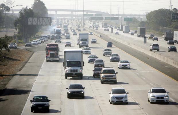 Traffic on a freeway in the California smog.