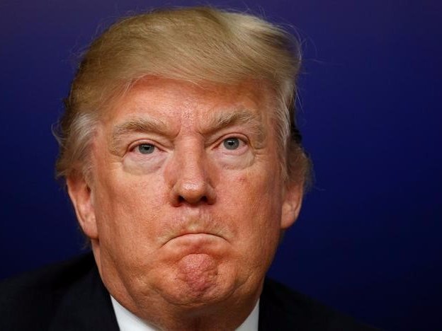 A picture of an angry looking Donald Trump.