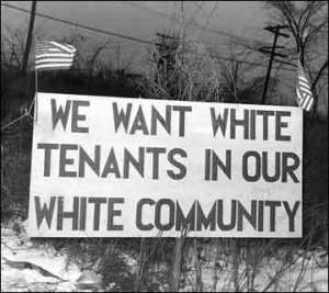 Racist sign outside neighborhood reads, "We want white tenants in our white community."