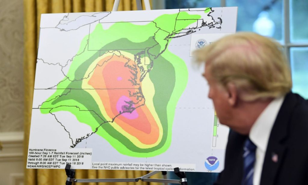 Trump studies Hurricane Florence's landfall.