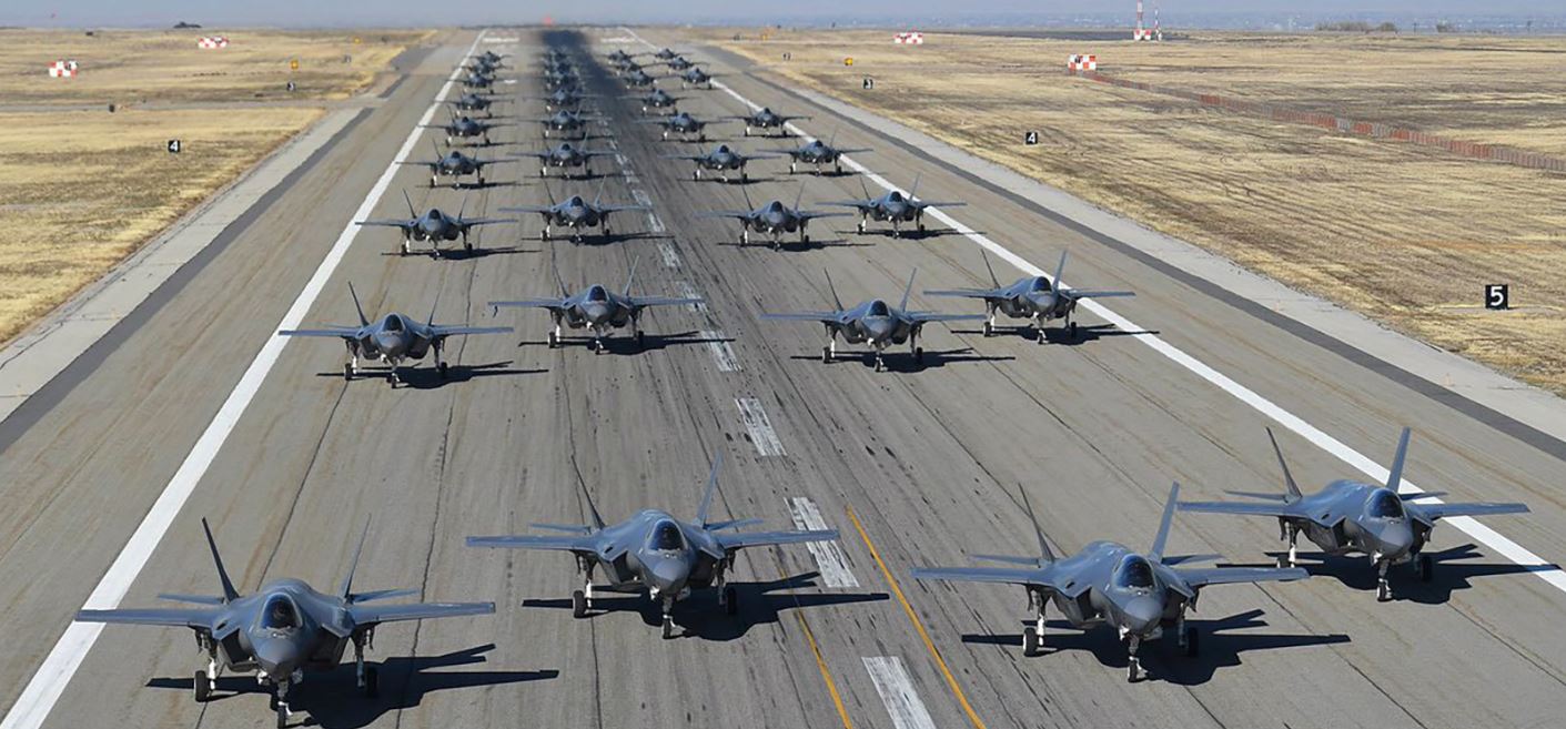F-35 jets lined up on a runway
