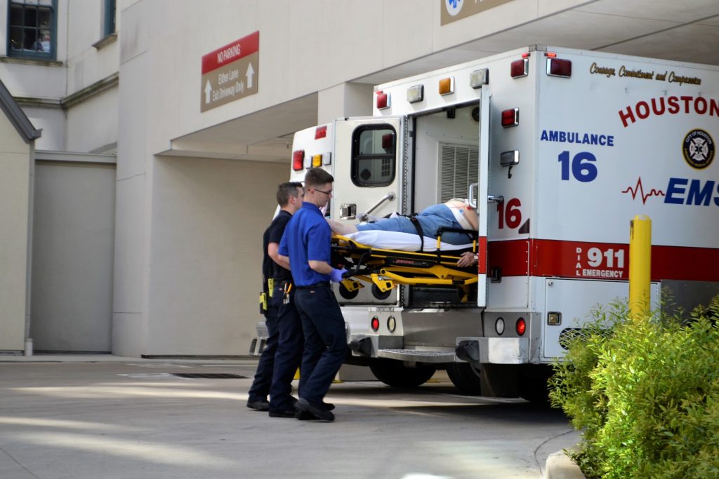 Hey, Democrats, Don’t Be Ashamed of Supporting Healthcare for Immigrants Loading a patient into an ambulance