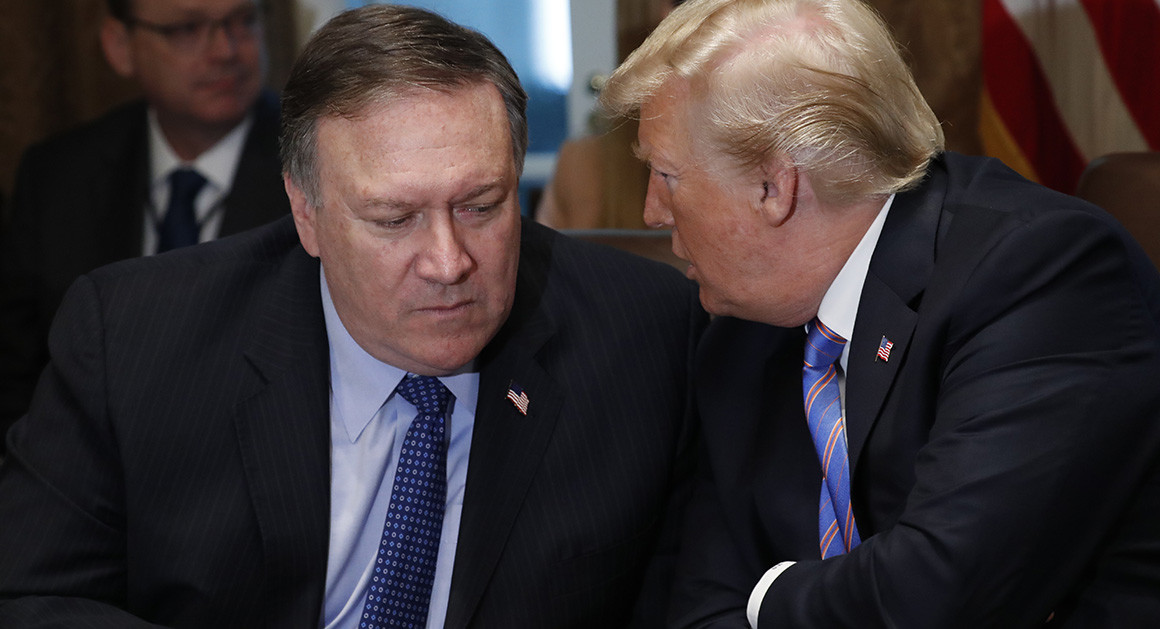 Mike Pompeo and Donald Trump in conversation.