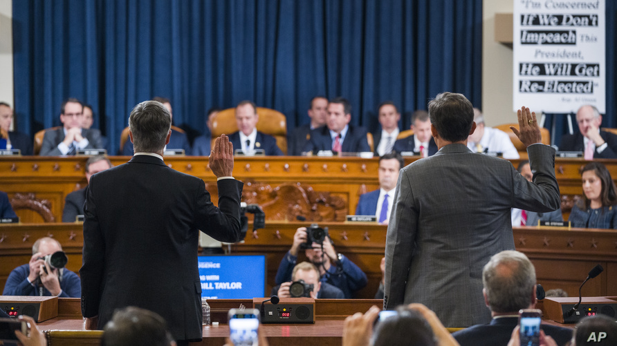 Top U.S. diplomat in Ukraine William Taylor, left, and Career Foreign Service officer George Kent are sworn in prior to testifying before the House Impeachment Hearings.