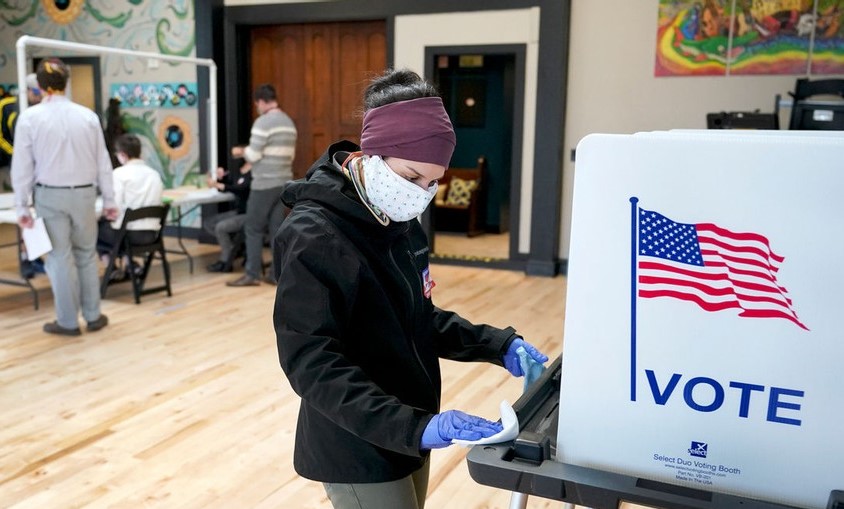 A Biden Landslide: The Best Case Scenario. A voter casts a ballot.