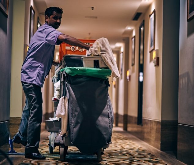 The Minimum Wage: A Hotel Housekeeper in Action. Photo by Ashwini Chaudhary on Unsplash