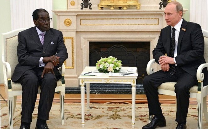 Vladimir Putin with the late Zimbabwe dictator Robert Mugabe