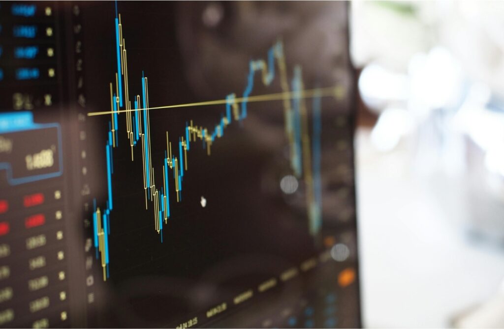 Close-up of screen with trading chart.