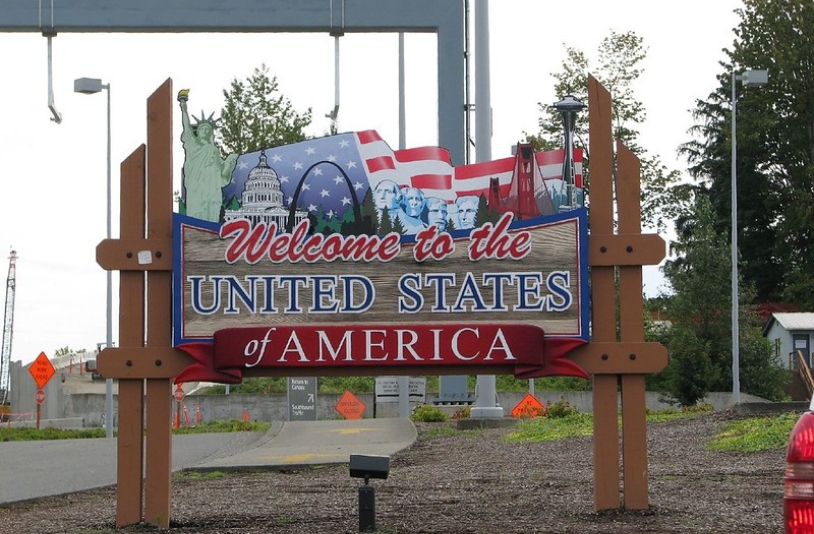 "Welcome To America" sign.