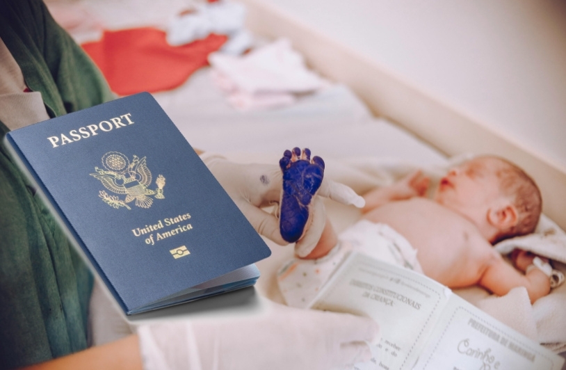 Newborn baby getting foot print taken with passport in foreground.