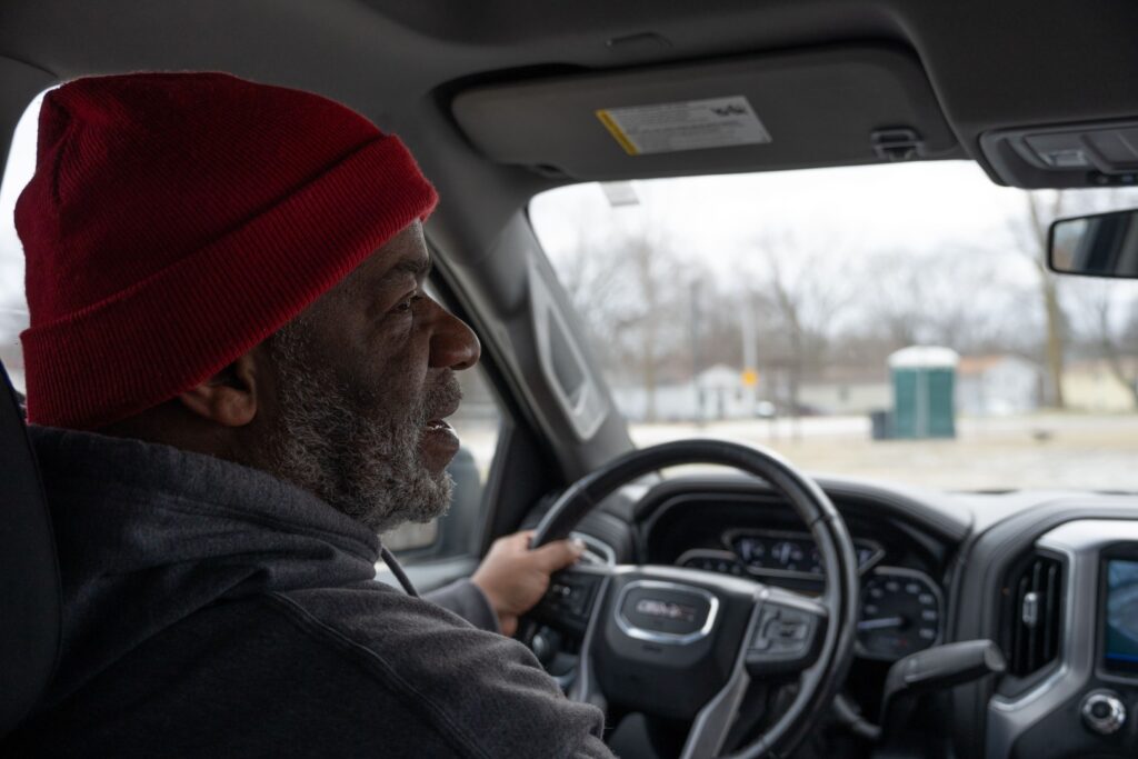 Man driving in car