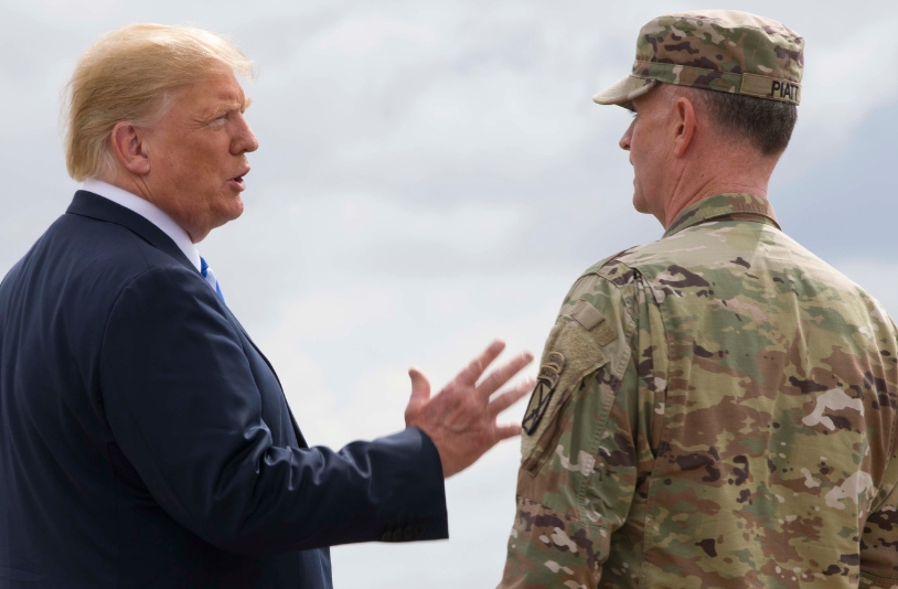 Trump with military personnel.