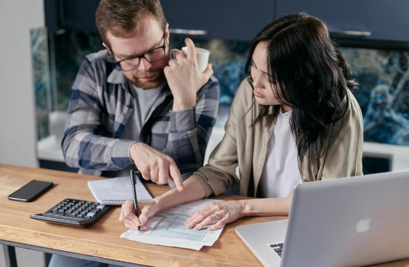 Couple Calculating all their Bills