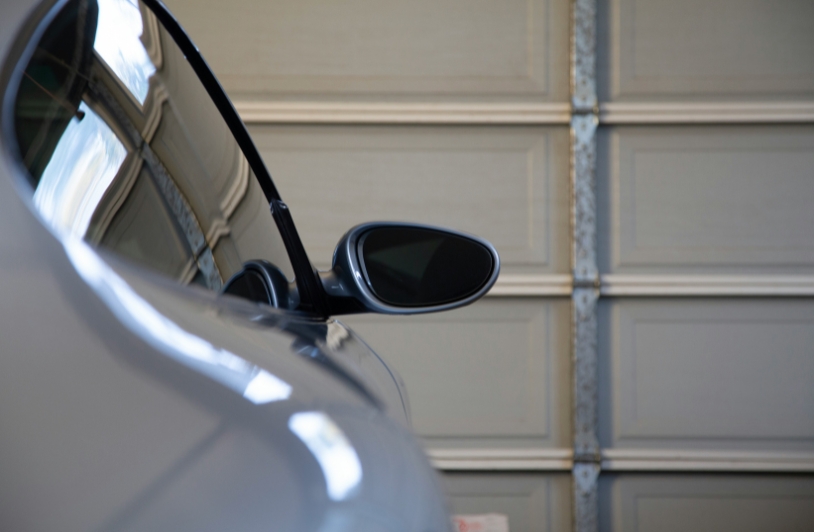 car in front of garage door