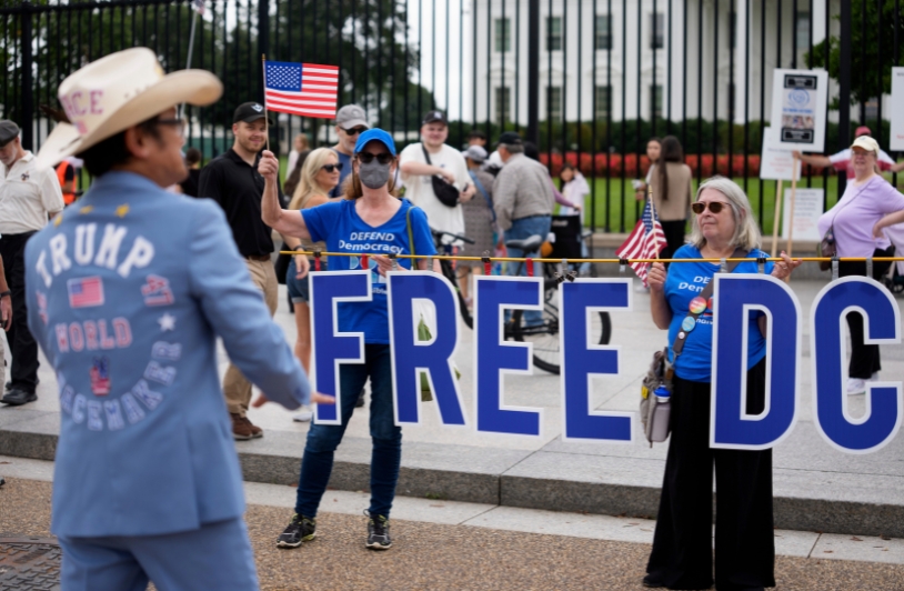 FREE DC protestors confronted by Trump supporter