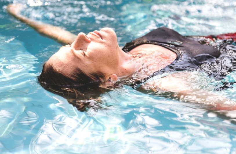 Water Works: Aquatic Therapy for Lower-Limb Rehab After Fractures or Joint Surgery Woman enjoying the water in a swimming pool
