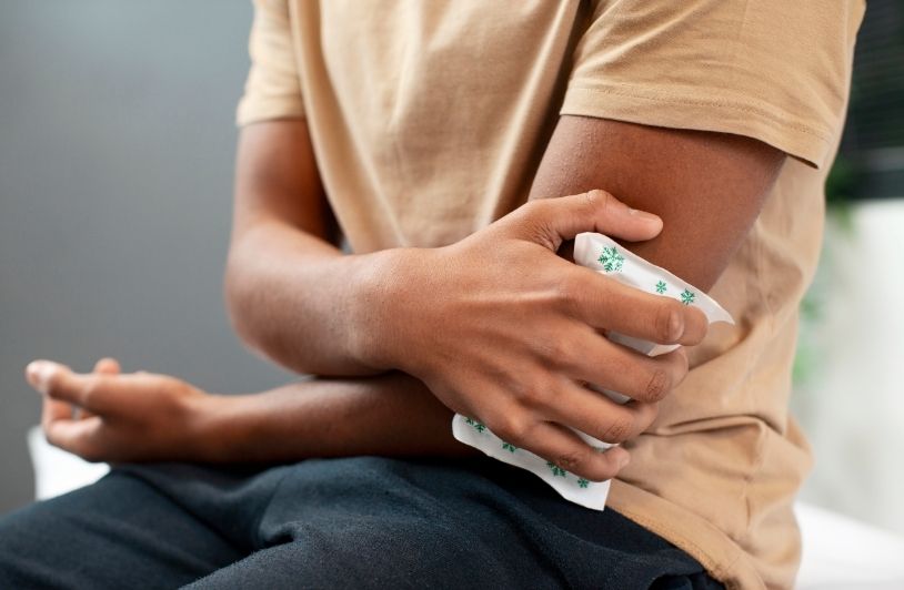 Doctor taking care of afro-american child