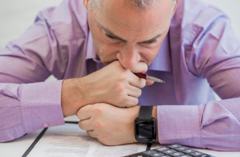 Anguished sad depressed lonely business man