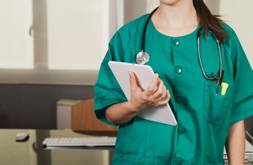 Nurse with checklist and stethoscope