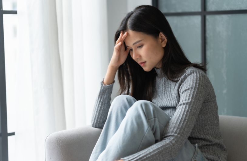Woman suffering from poor mental health