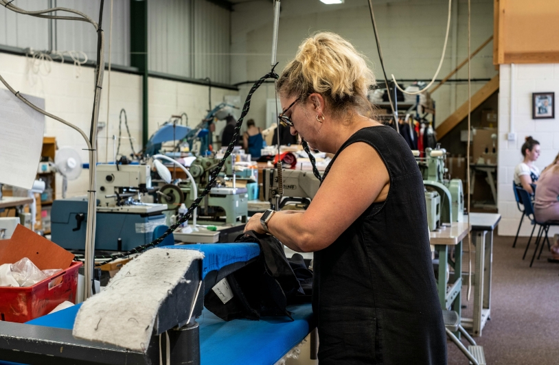 repetitive motion factory worker female