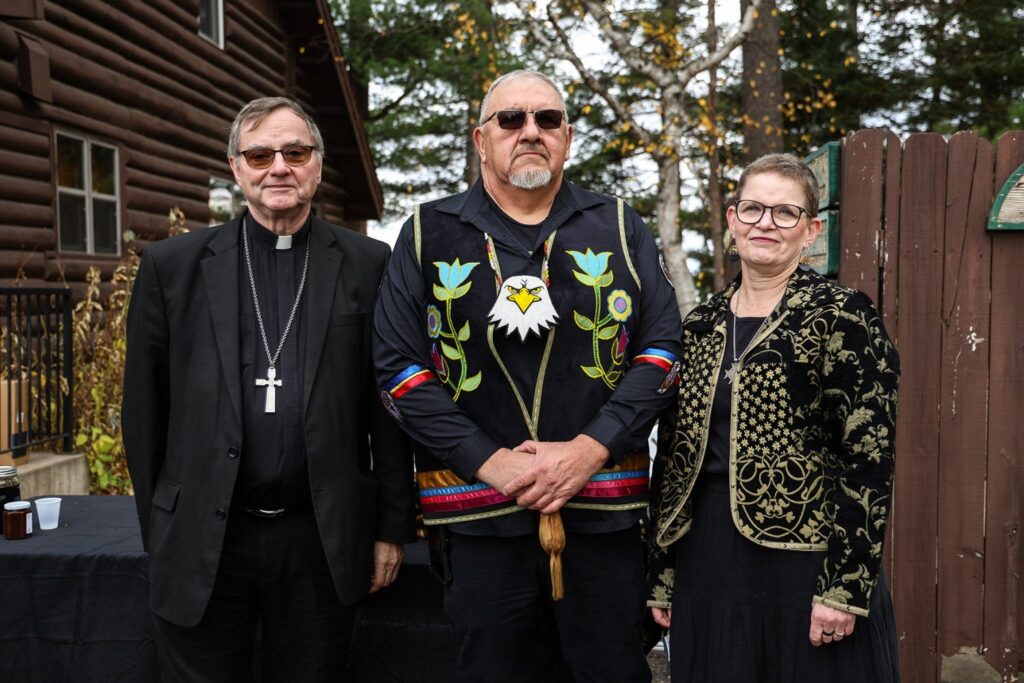 Bishop James Powers, John D. Johnson, Sr., Tribal President of the Lac du Flambeau Band of Lake Superior Chippewa Indians, and Sister Sue Ernster