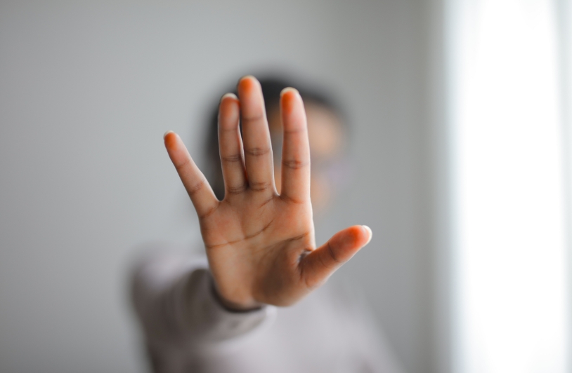 hand up expressing denial