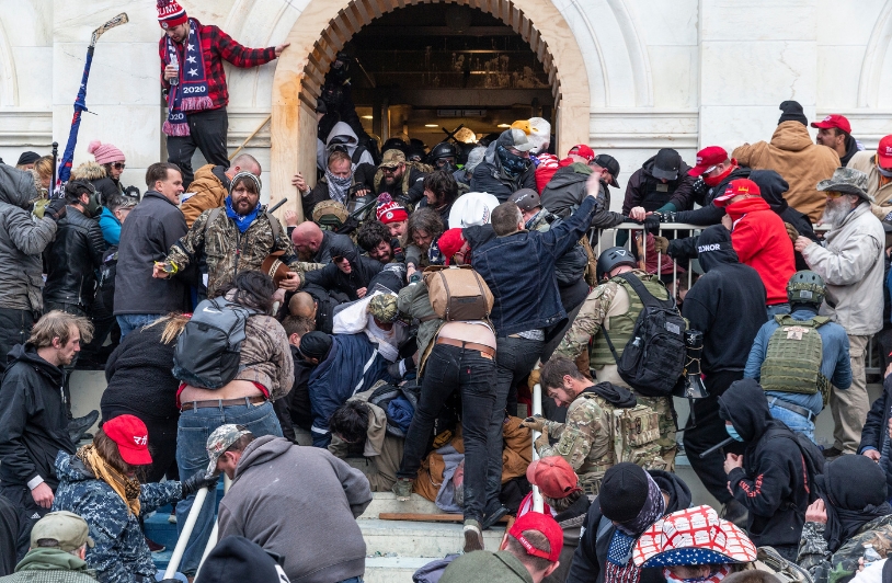 Five Years After January 6, Dozens of Pardoned Insurrectionists Have Been Arrested Again Rioters at the Capitol building in Washington DC