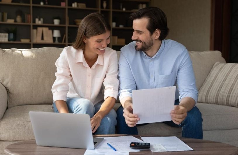 a couple reviewing their rental contract