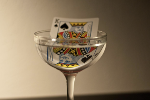 King of spades in martini glass