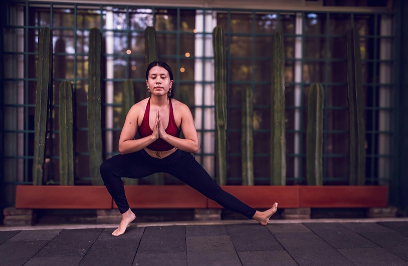 Holistic Yoga: Mindfulness, Strength, and Community Woman doing yoga.