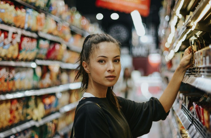 Why More Consumers Are Buying Everyday Products Online Instead of In Stores Person browsing products on a laptop while sitting at a desk