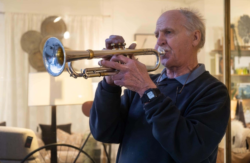 A man playing trumpet. 