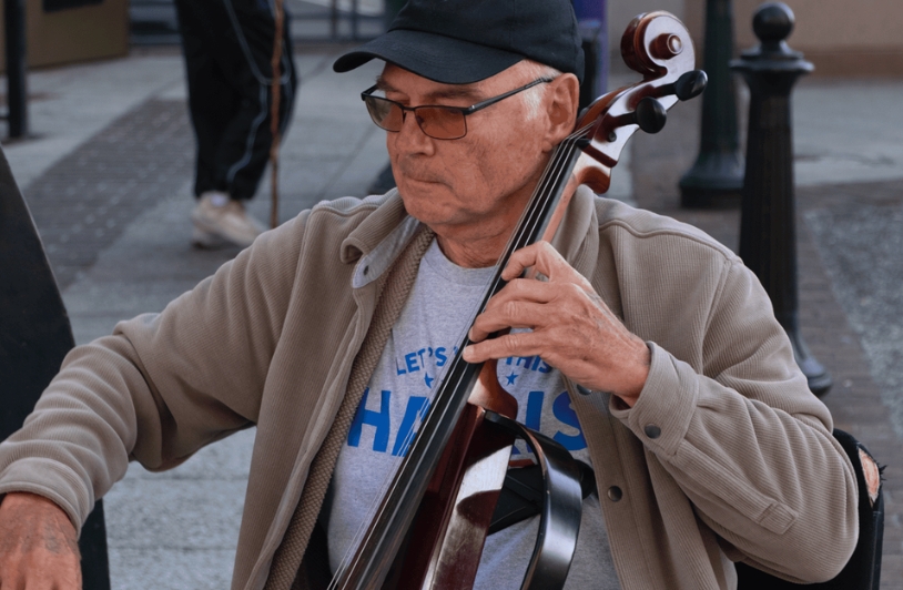 A man playing cello. 