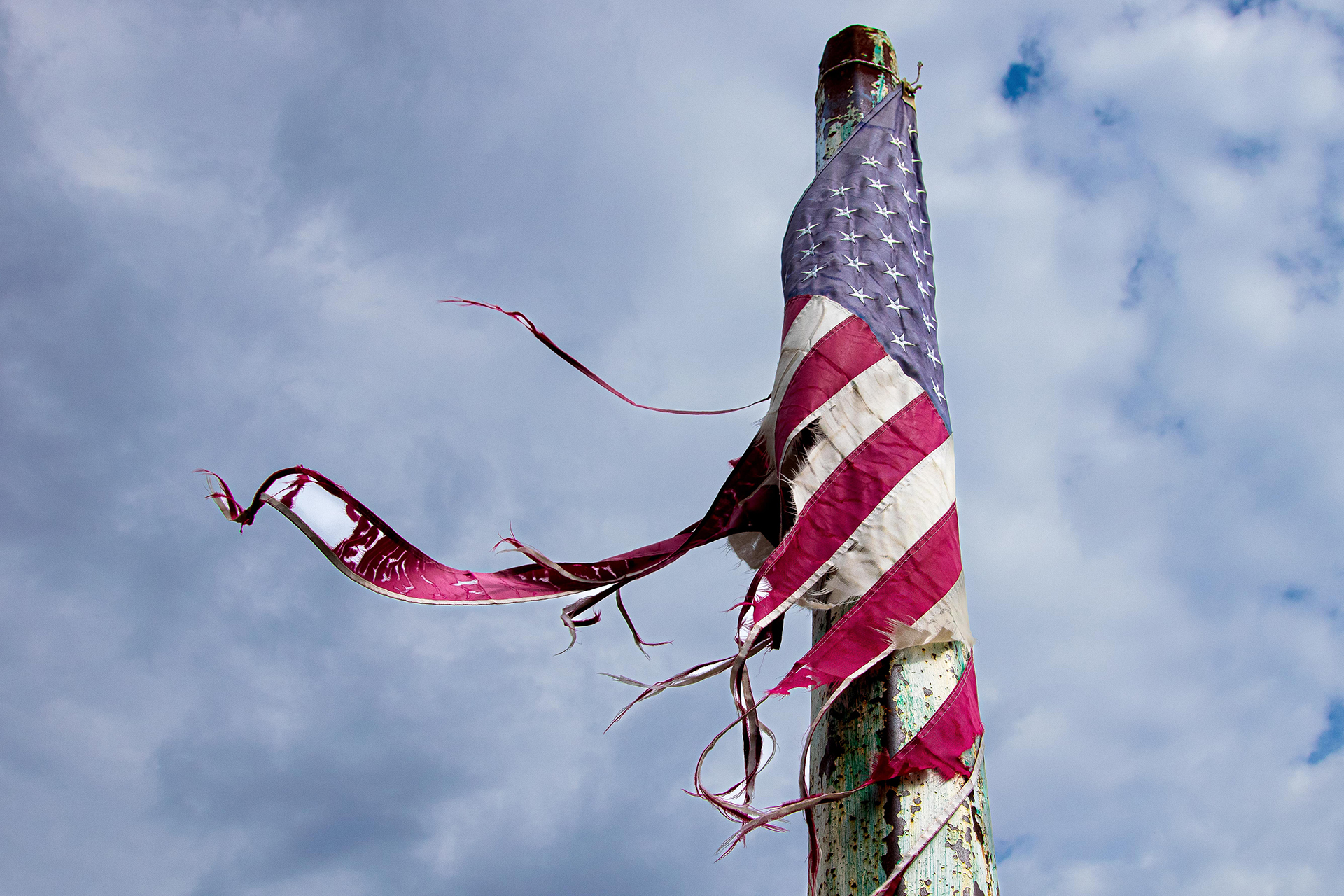 tattered us flag in ashville