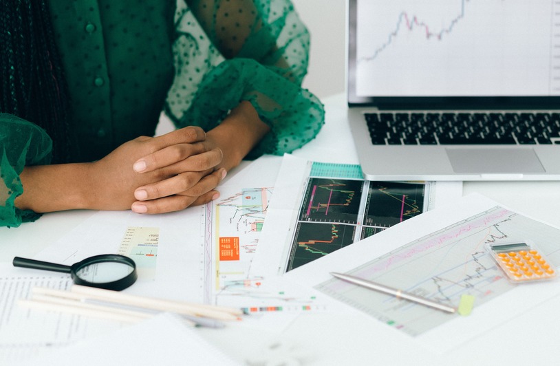 Understanding the Market Forces Shaping the Next Wave of IPOs Traders on a busy stock exchange floor watching market screens