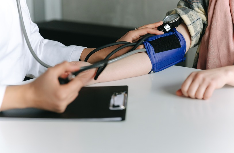 When Persistent Leg Swelling Signals It Is Time for Vein Care A medical professional examining a patient's swollen lower leg