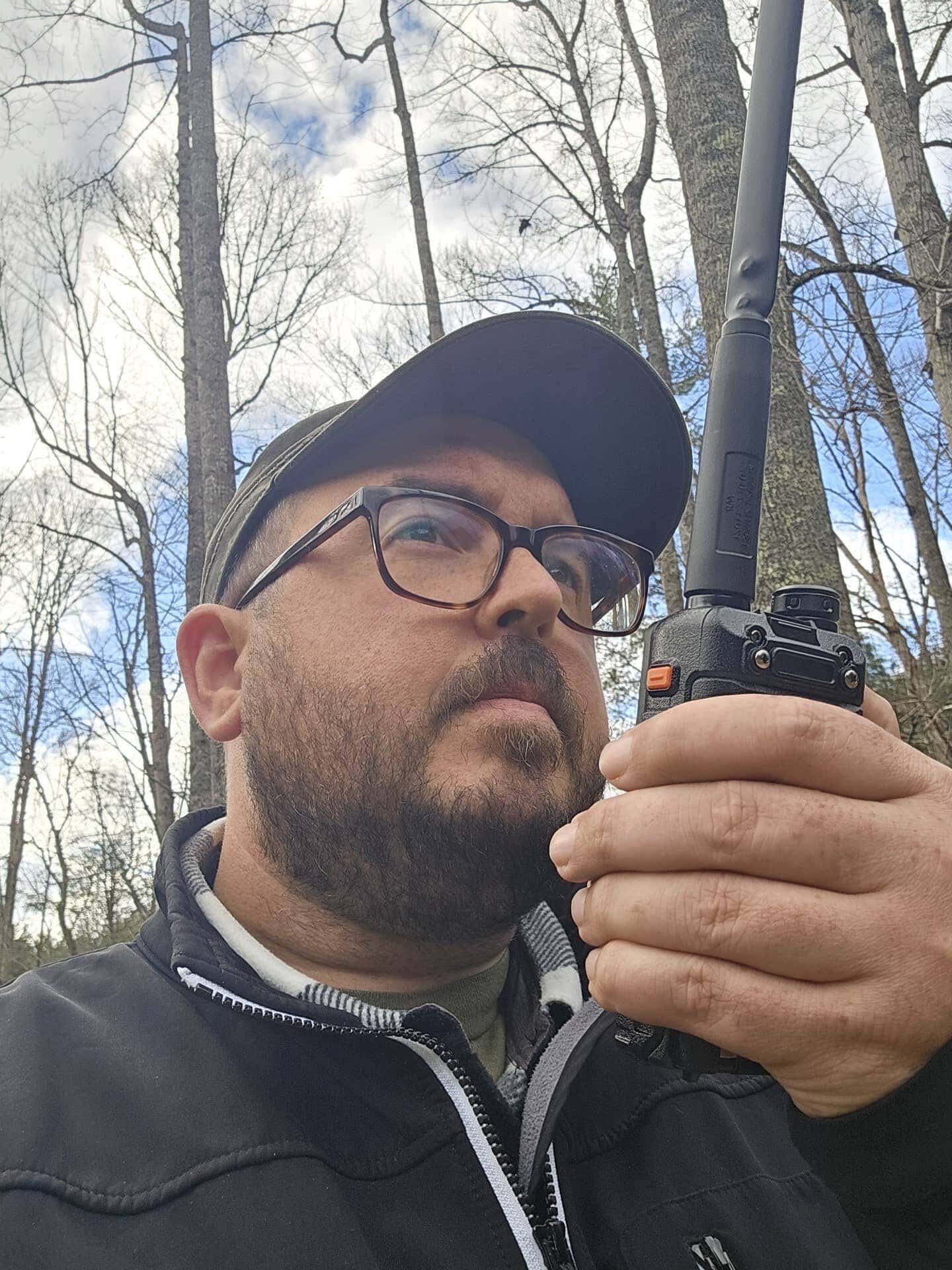 Man with hand radio