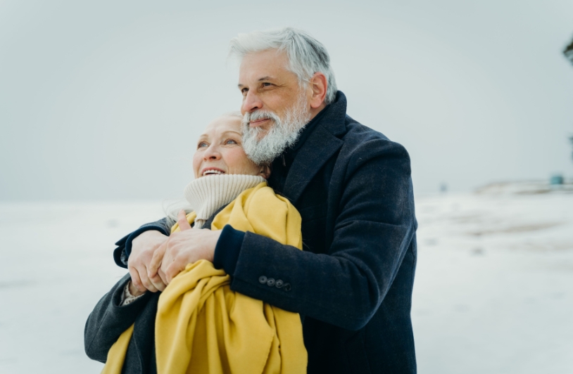 Senior couple embracing rural seeting