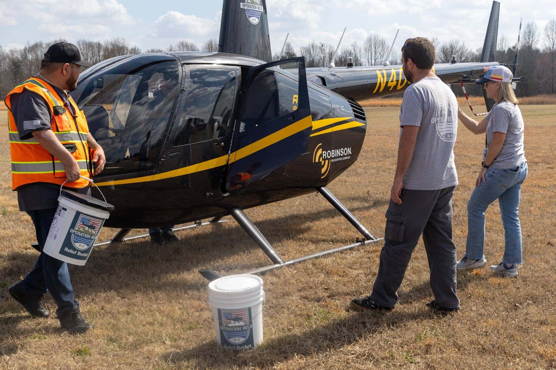 People around helicopter