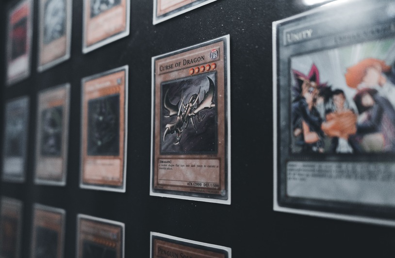 OH Canada: Can the Stanley Cup Curse Be Broken this Year? A close-up view of Yu-Gi-Oh! trading cards in a display case showcasing rare and collectible cards.