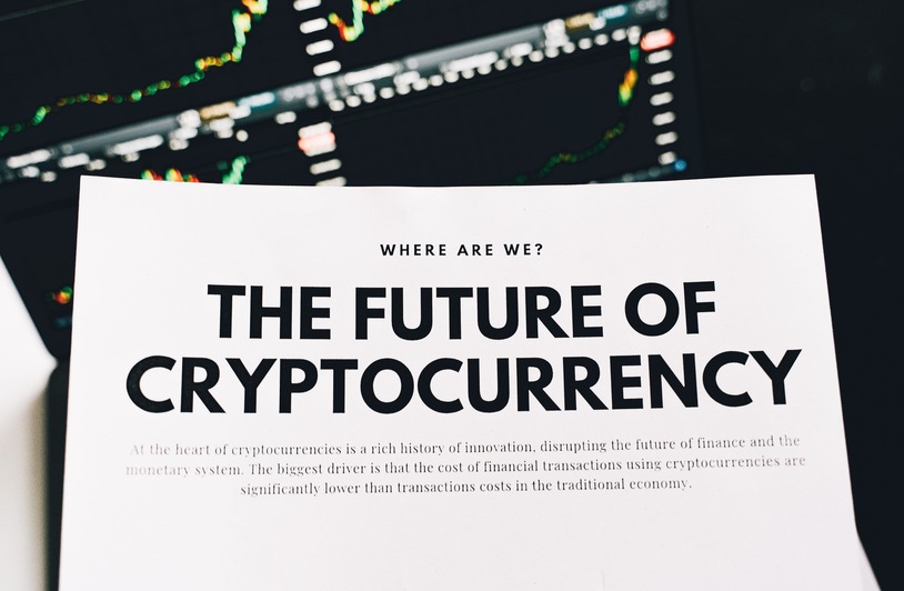 Investing in the Future: The Serhii Tokarev Foundation and uBoost Sum Up SheLeads Close-up of a finance article on cryptocurrency with charts in the background.