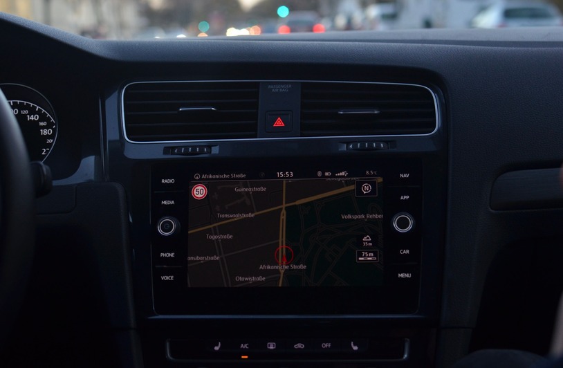 Why State Borders Behave Like Product Settings: NuxGame On Sweepstakes Casino Software Car dashboard with a touchscreen navigation display showing a map, speedometer visible on the left, dark interior trim