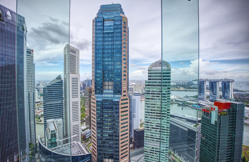 SynchroNet: The IT Partner Turning Buffalo Businesses into Powerhouses. Stunning view of Singapore skyline with iconic Marina Bay Sands and skyscrapers.