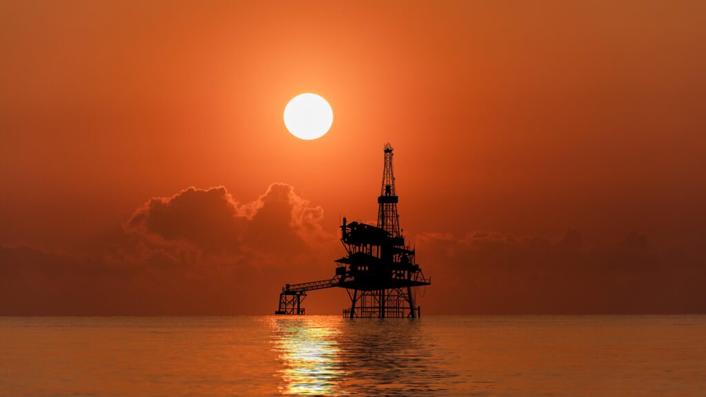 Oil rig at sunset