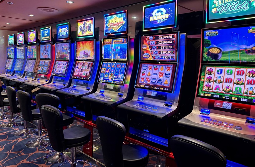 Jili77 on GZone: Explore New JILI Games and Discover a Fresh Digital Gaming Experience Bright casino slot machines with colorful displays